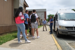 Students wait in line to explore the van